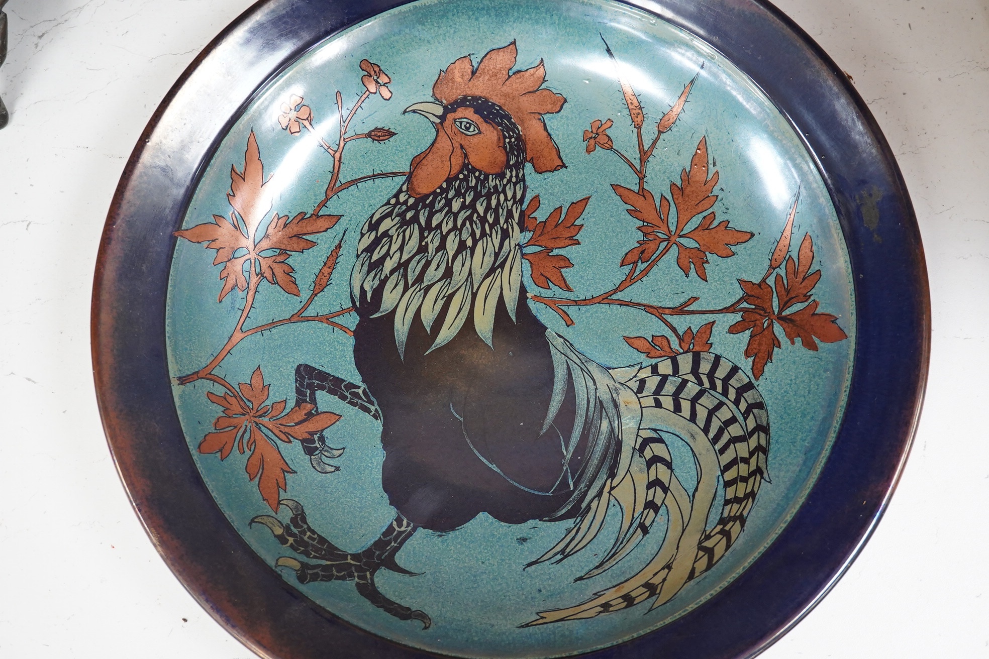 A Jonathan Chiswell Jones lustre 'Chicken' dish, 34cm diameter. Condition - some glazing flaws